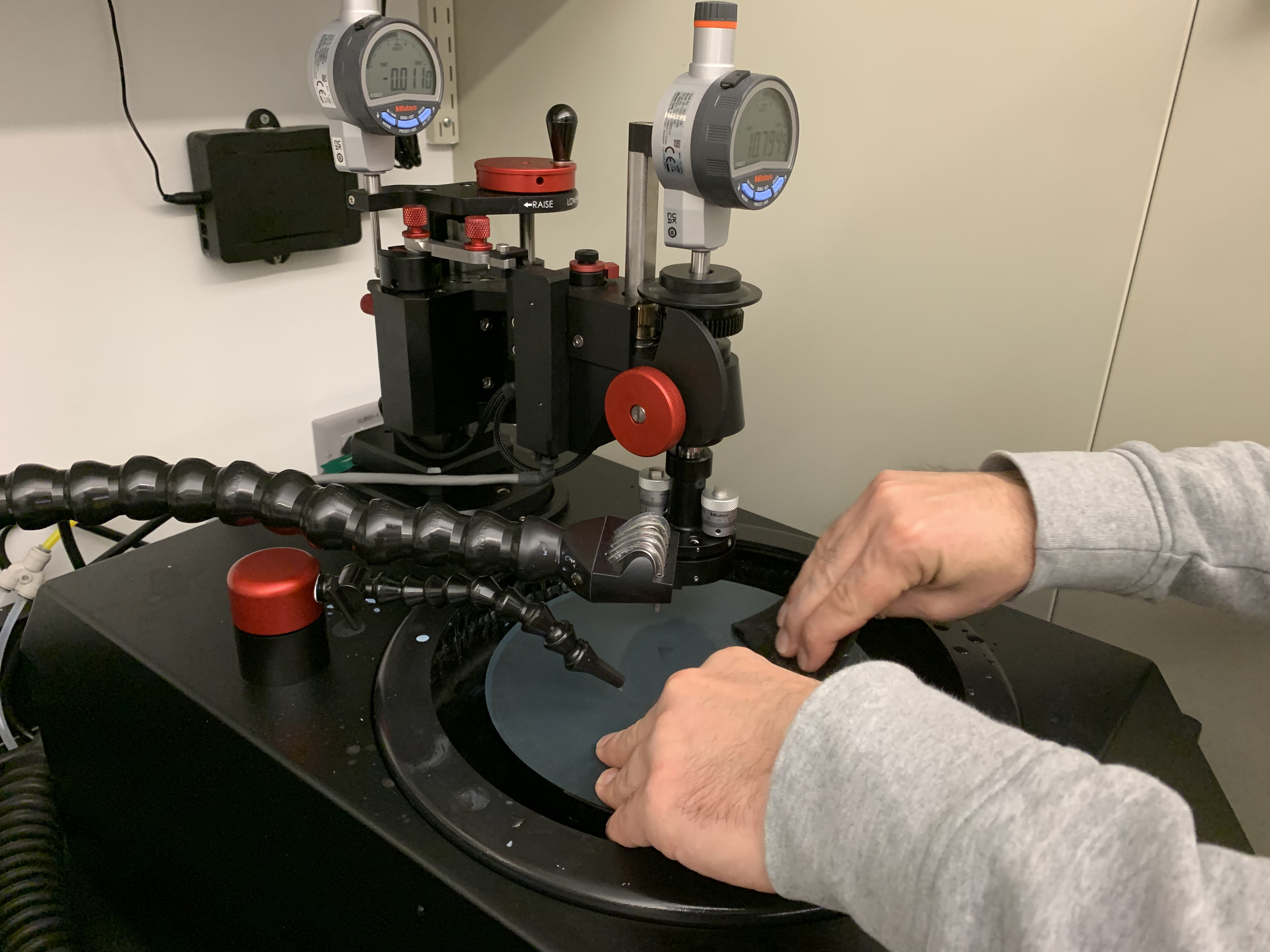 Installing a grit paper.